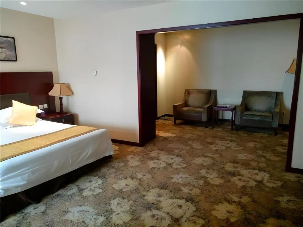 Bed in Zhong Yi Peng Ao Hotel