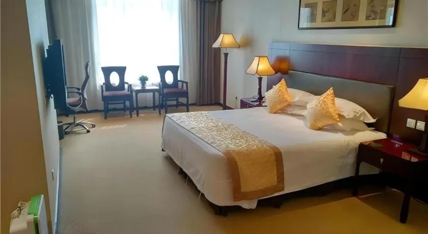 Bed in Zhong Yi Peng Ao Hotel