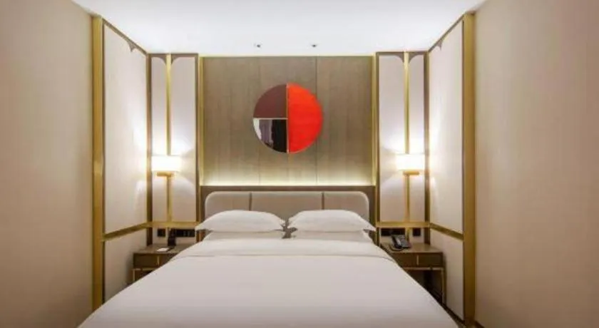 Bed in Zhong Yi Peng Ao Hotel