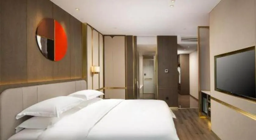 Bed in Zhong Yi Peng Ao Hotel