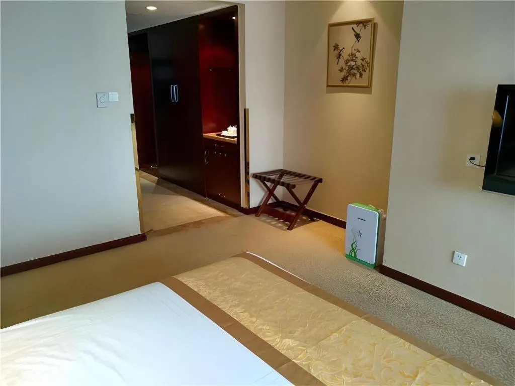 Bed in Zhong Yi Peng Ao Hotel