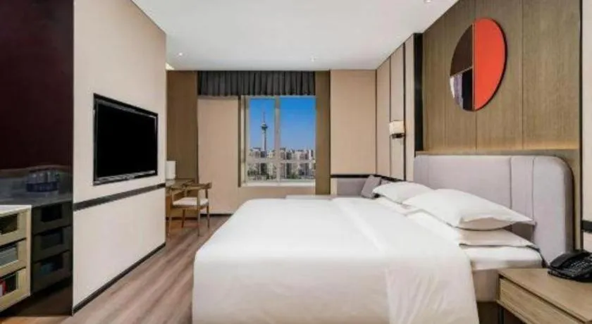 Bed in Zhong Yi Peng Ao Hotel