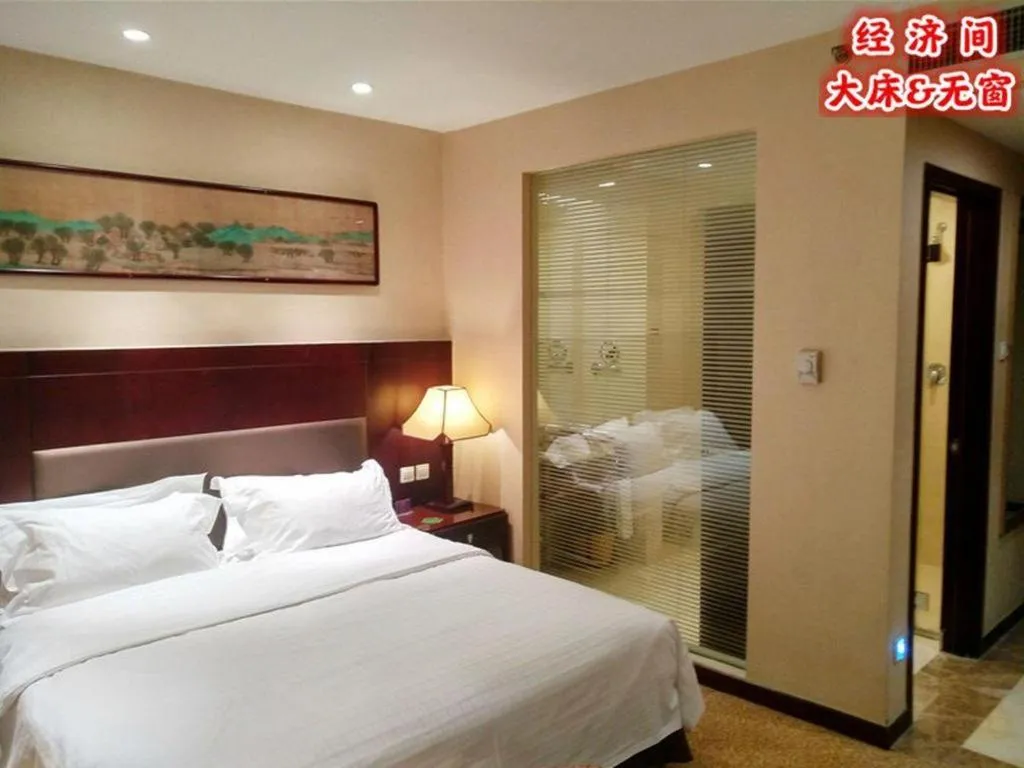 Bed in Zhong Yi Peng Ao Hotel
