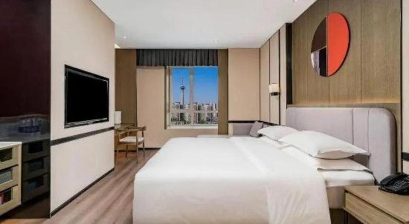 Bed in Zhong Yi Peng Ao Hotel