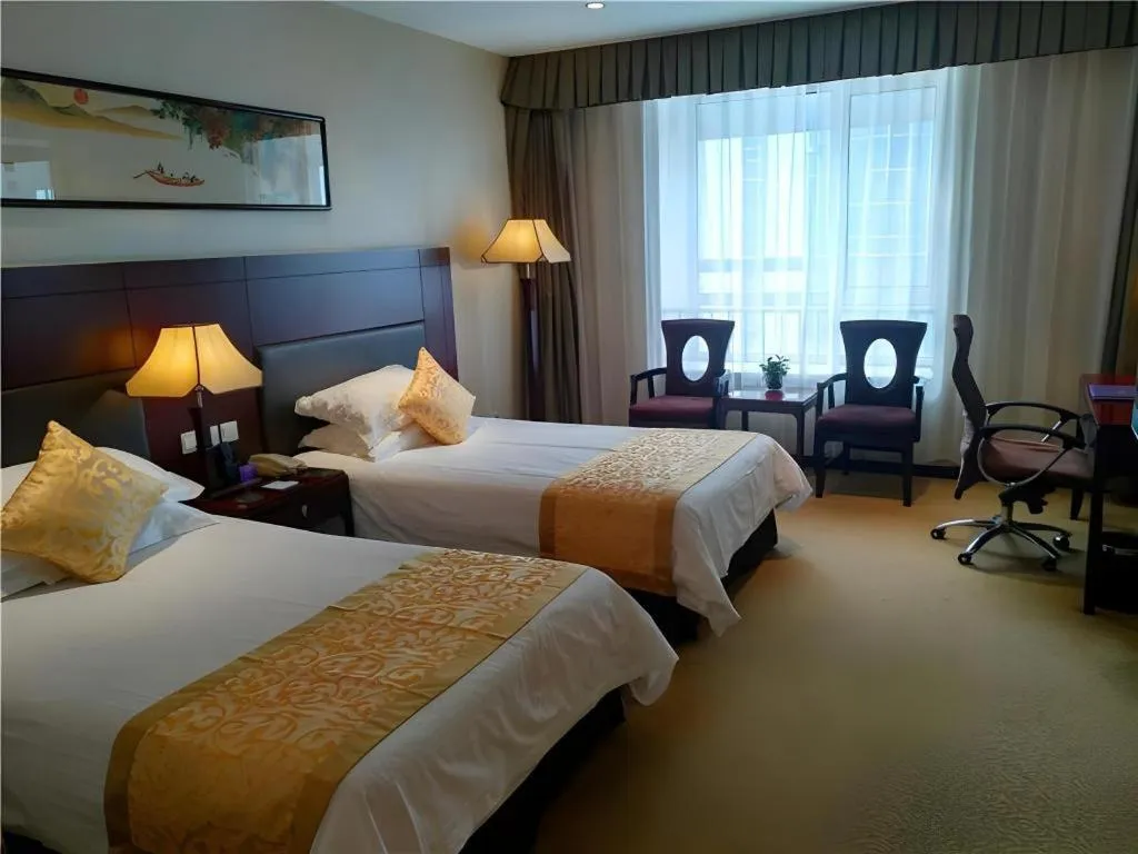 Bed in Zhong Yi Peng Ao Hotel