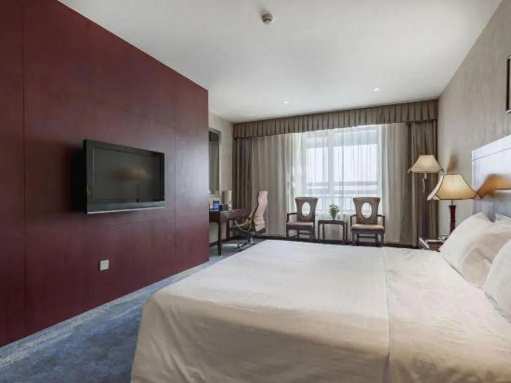 Bed in Zhong Yi Peng Ao Hotel