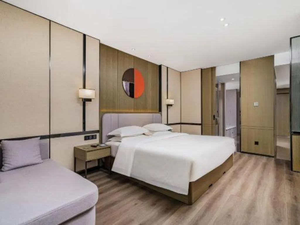 Bed in Zhong Yi Peng Ao Hotel