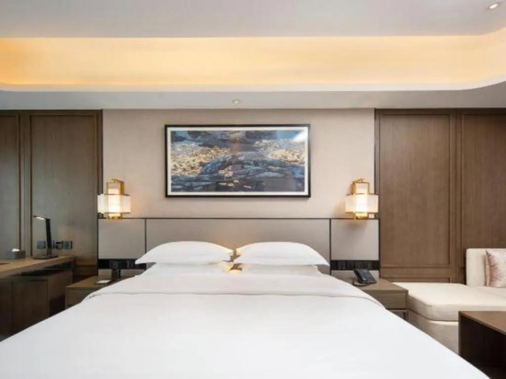 Bed in Zhong Yi Peng Ao Hotel