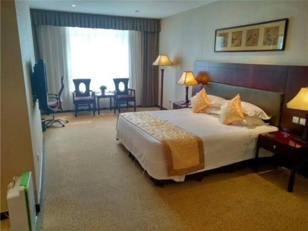 Bed in Zhong Yi Peng Ao Hotel