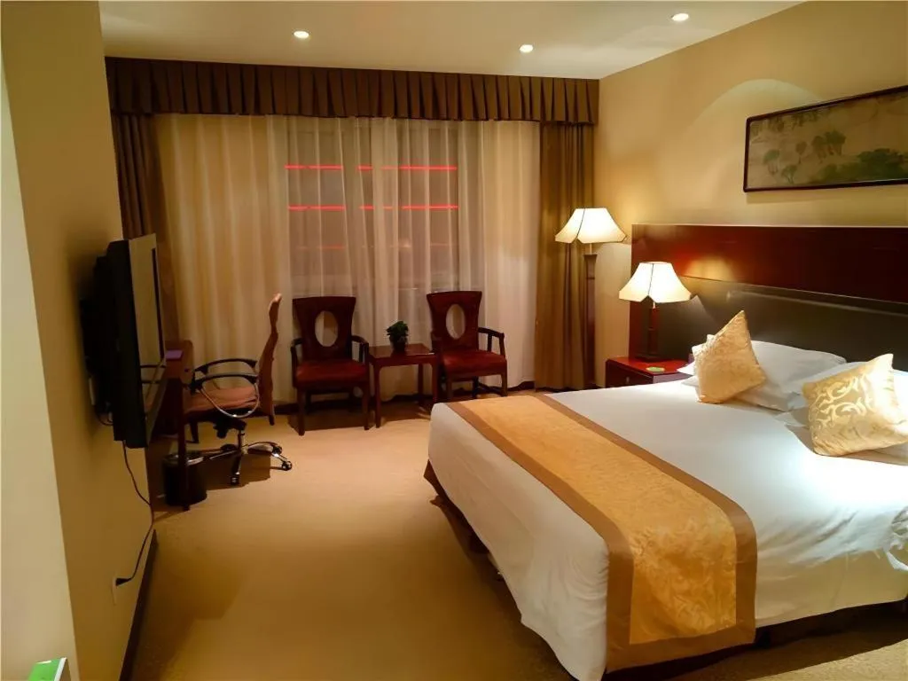 Bed in Zhong Yi Peng Ao Hotel
