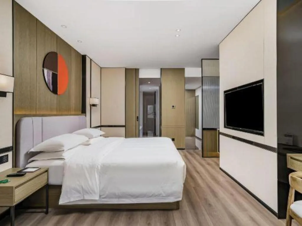 Bed in Zhong Yi Peng Ao Hotel