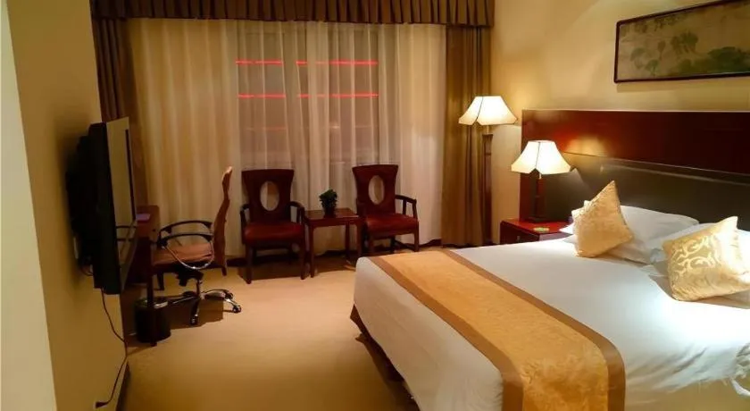 Bed in Zhong Yi Peng Ao Hotel