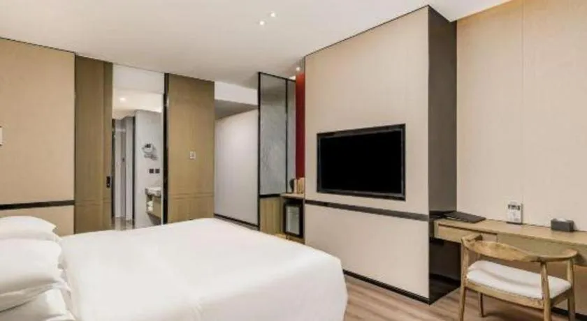 Bed in Zhong Yi Peng Ao Hotel