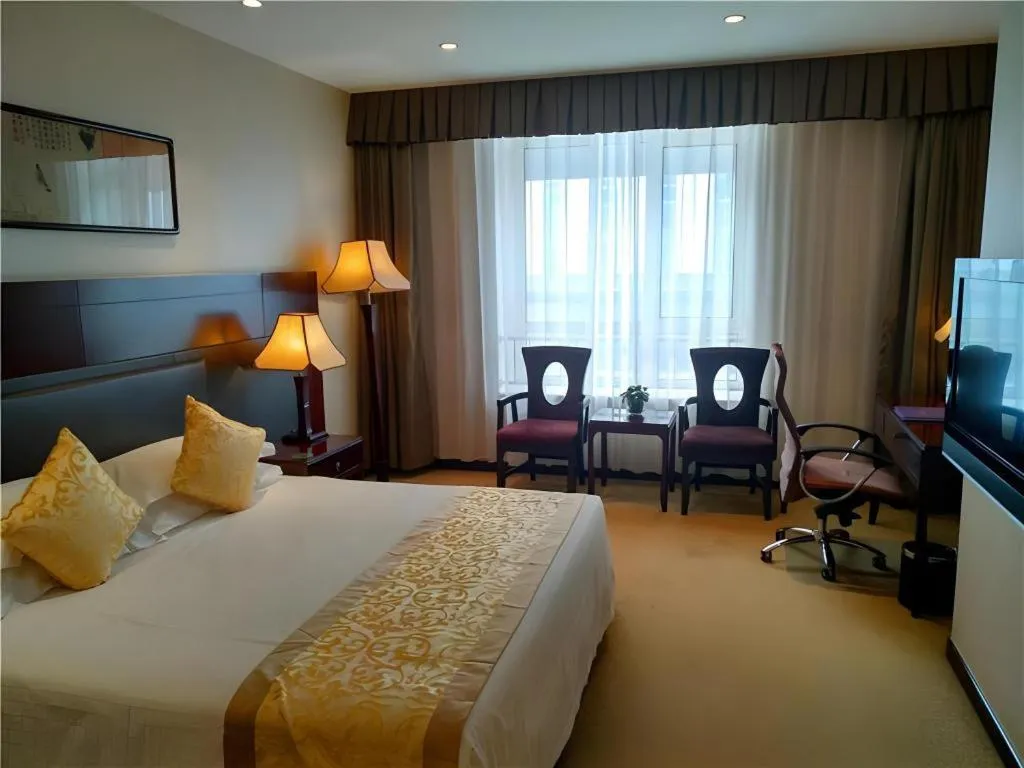 Bed in Zhong Yi Peng Ao Hotel