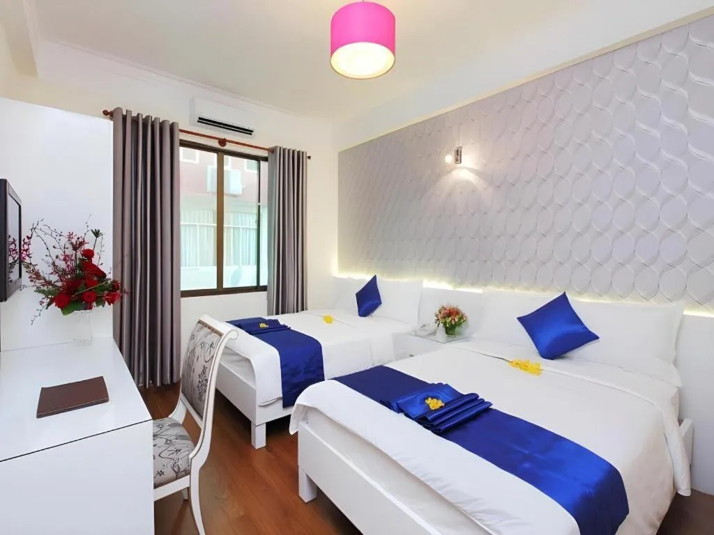 Bed in Blue River Hotel