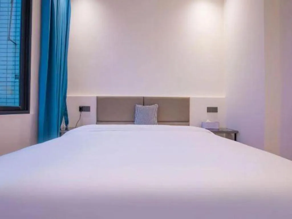 Bed in Silver Art Hotel