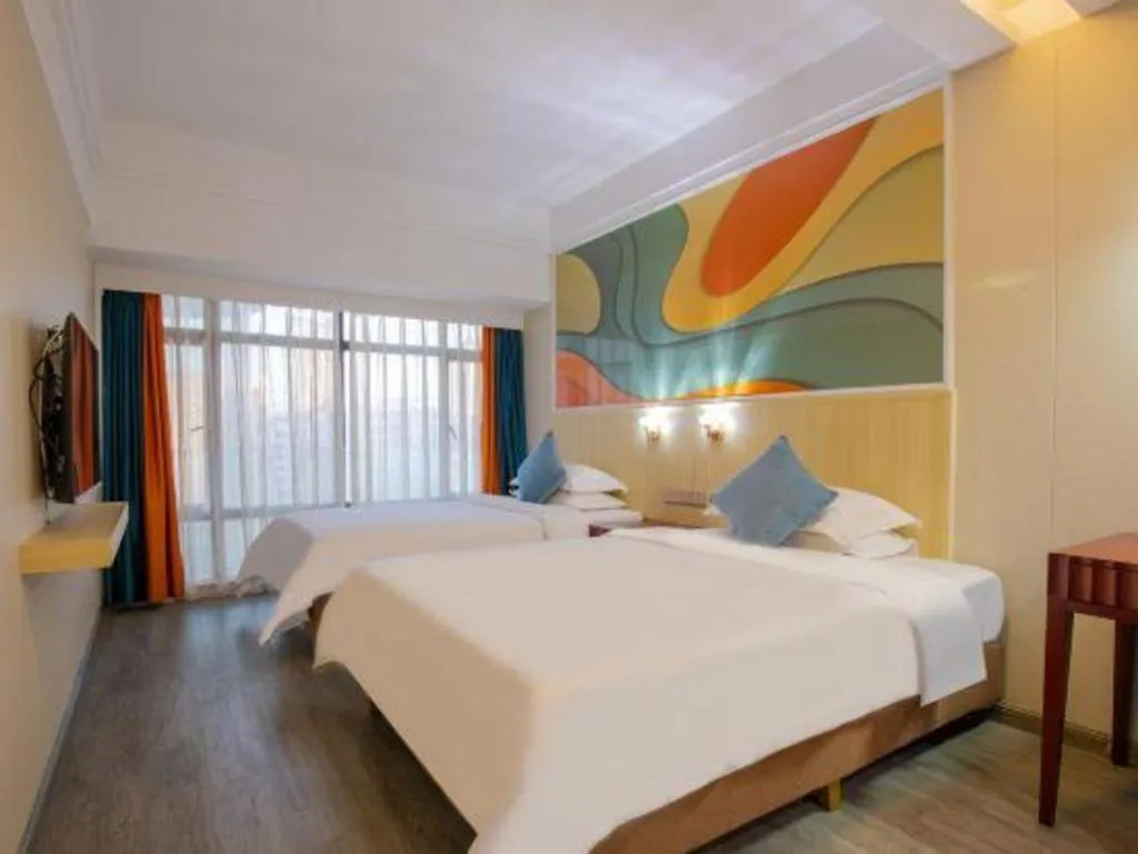 Bed in Silver Art Hotel