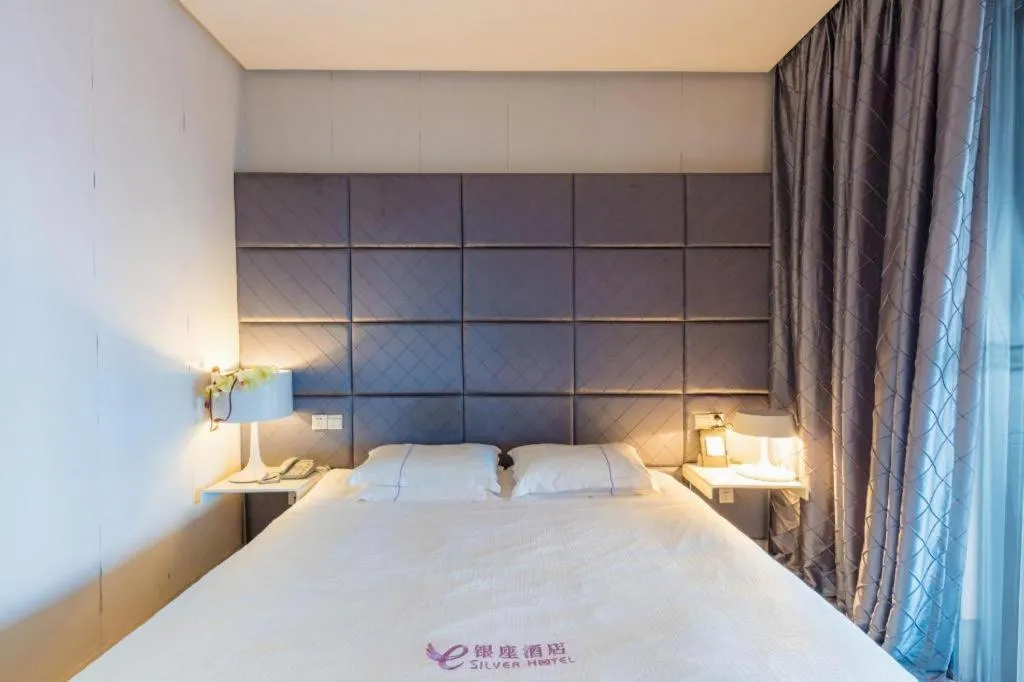Bed in Silver Art Hotel