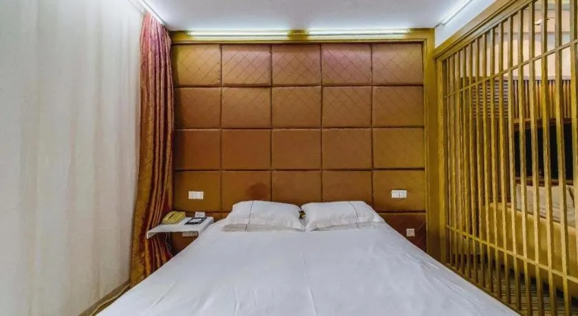 Bed in Silver Art Hotel