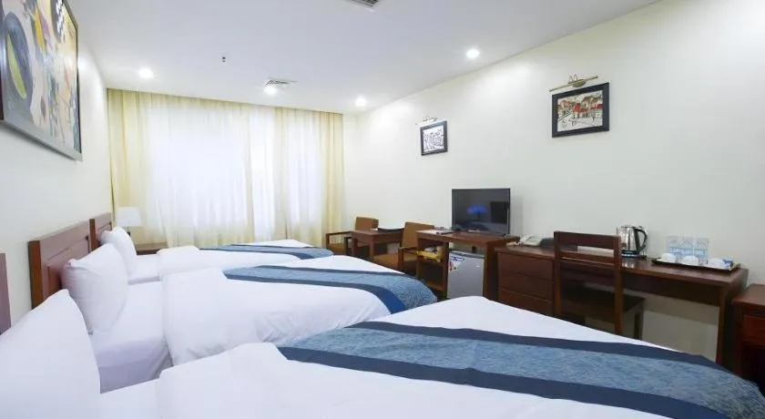 Bed in Vientiane Plaza Hotel