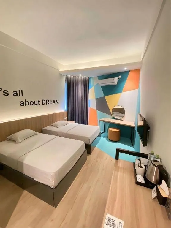 Bed in Alexander Hotel Tegal