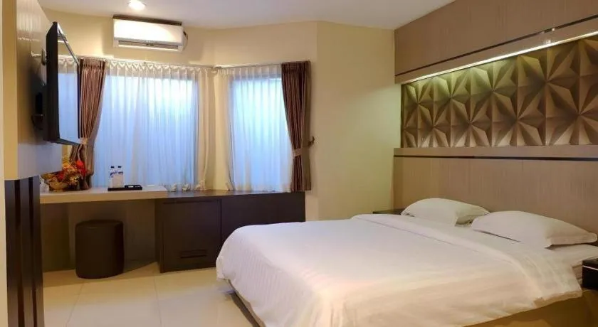 Bed in Alexander Hotel Tegal