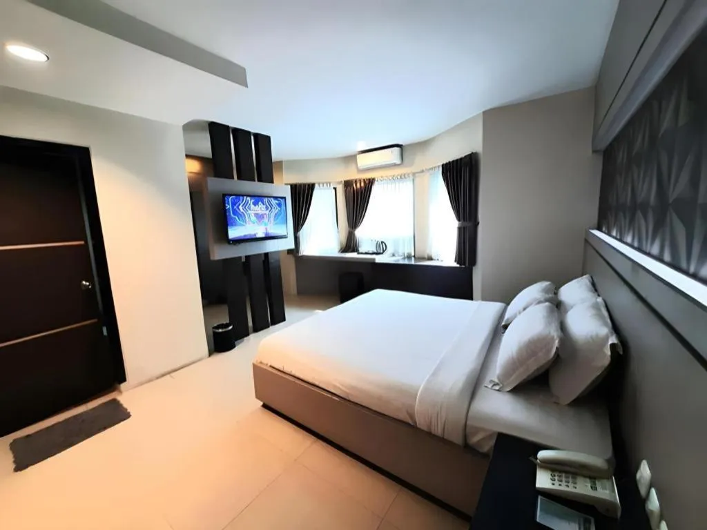 Bed in Alexander Hotel Tegal