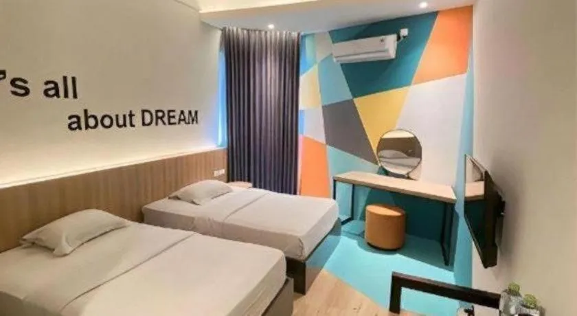 Bed in Alexander Hotel Tegal