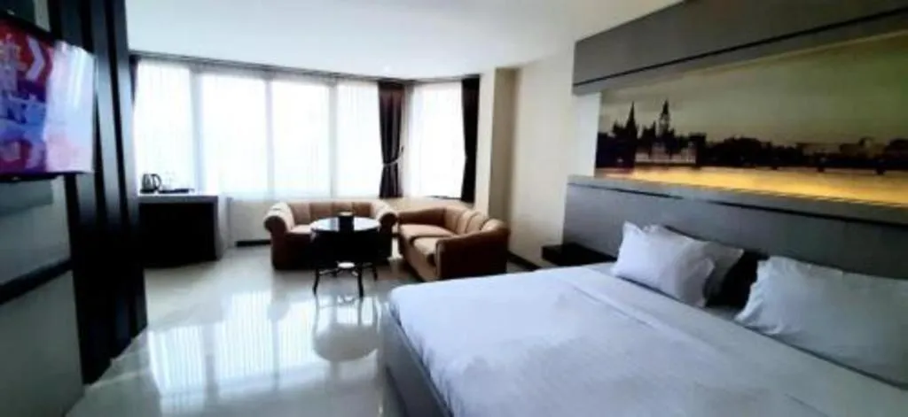 Bed in Alexander Hotel Tegal