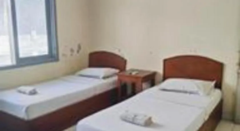 Bed in Alexander Hotel Tegal