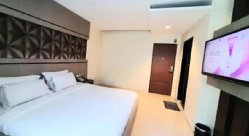 Bed in Alexander Hotel Tegal