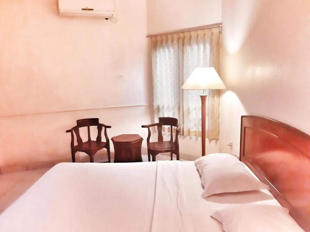 Bed in Alexander Hotel Tegal