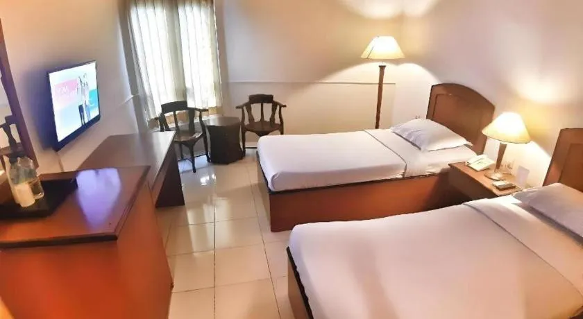 Bed in Alexander Hotel Tegal