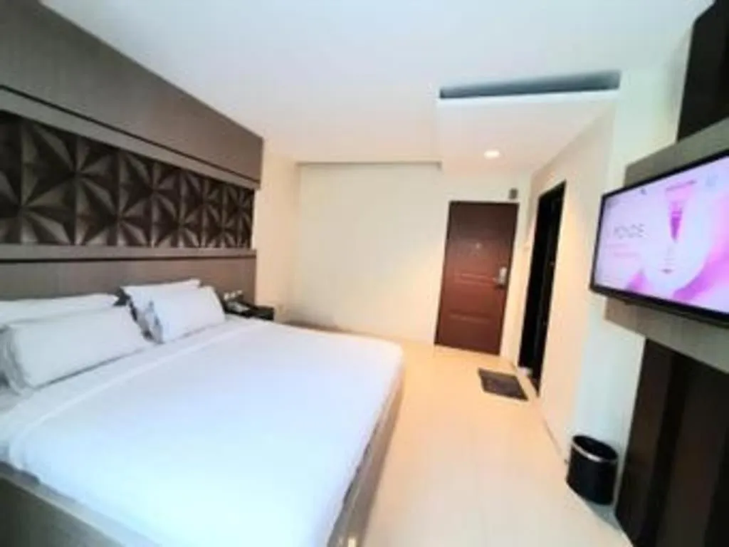 Bed in Alexander Hotel Tegal