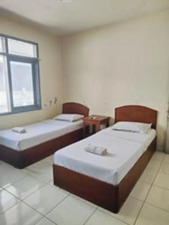 Bed in Alexander Hotel Tegal