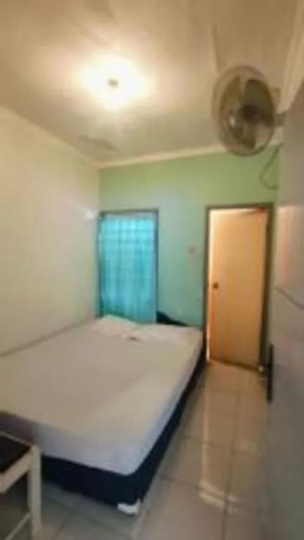 Bed in Alexander Hotel Tegal