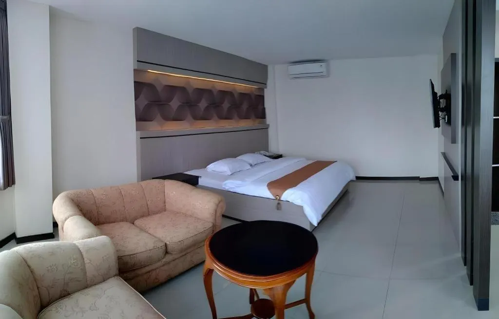 Bed in Alexander Hotel Tegal