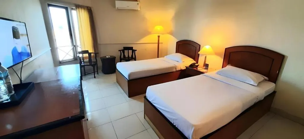 Bed in Alexander Hotel Tegal