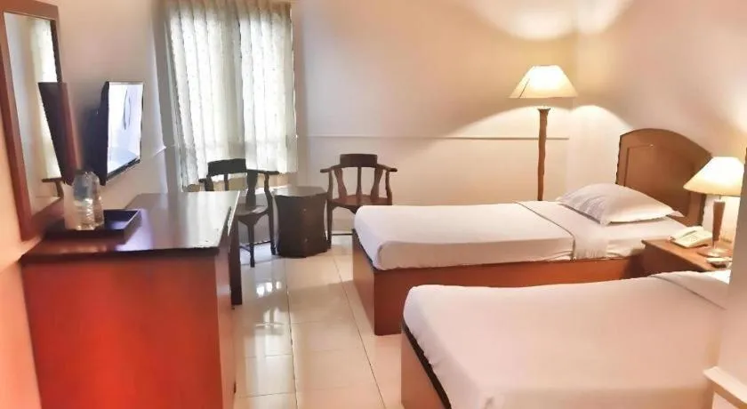 Bed in Alexander Hotel Tegal