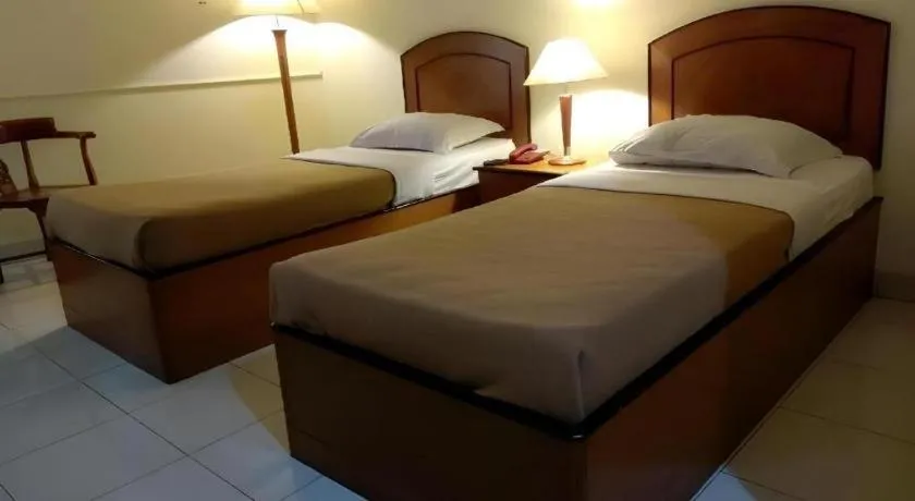 Bed in Alexander Hotel Tegal
