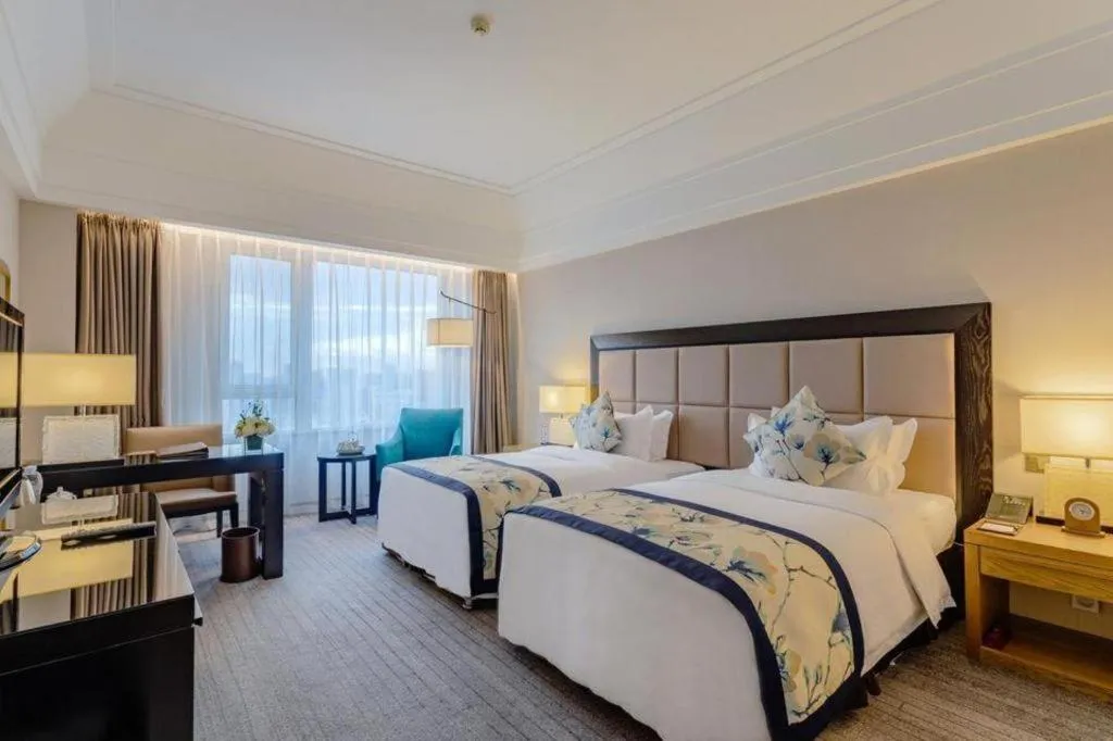 Bed in Shenyang Haiyun Jinjiang International Hotel
