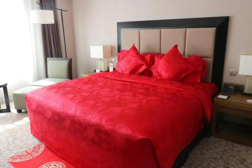 Bed in Shenyang Haiyun Jinjiang International Hotel