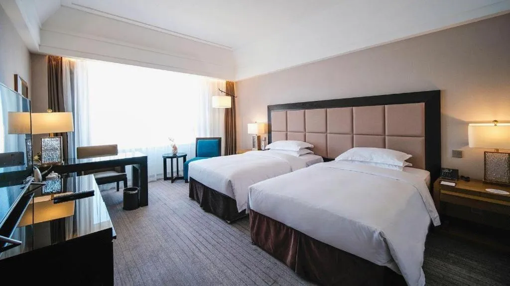 Bed in Shenyang Haiyun Jinjiang International Hotel