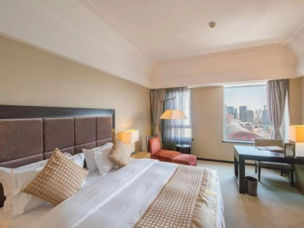 Bed in Shenyang Haiyun Jinjiang International Hotel