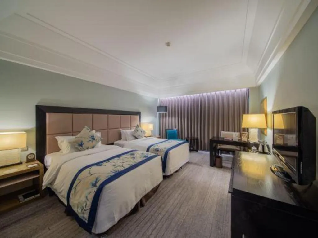 Bed in Shenyang Haiyun Jinjiang International Hotel