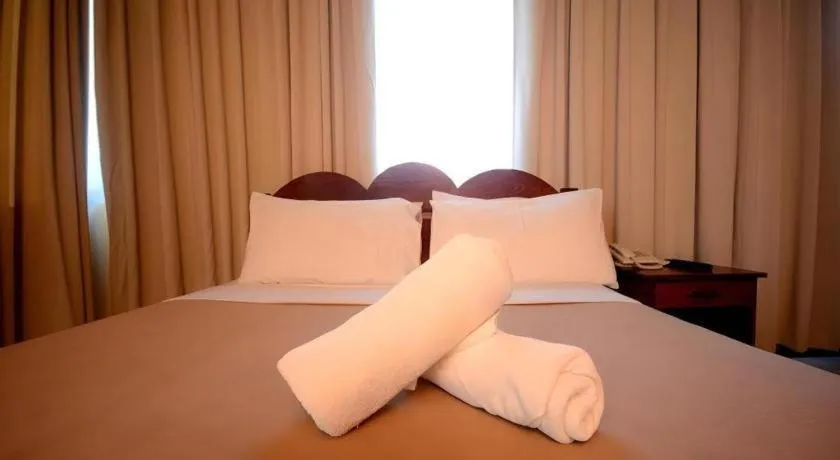 Bed in Ipil Suites El Nido