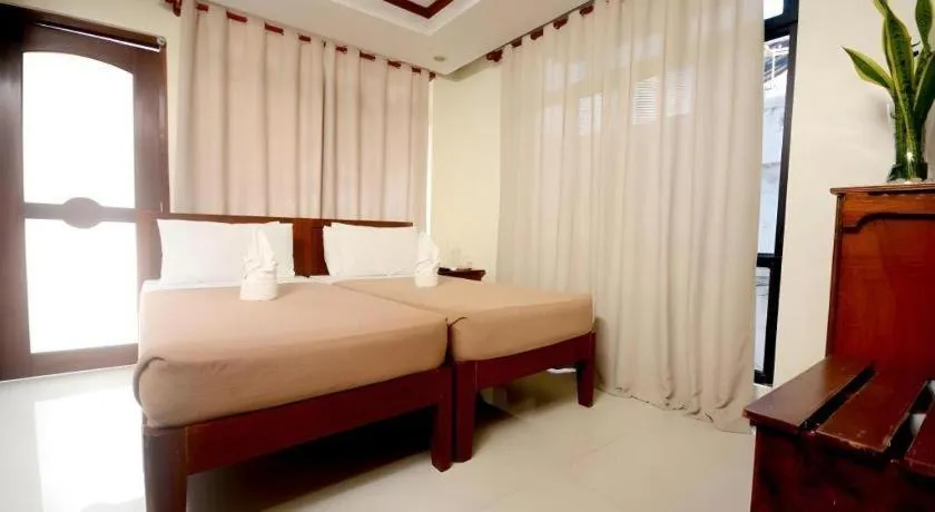 Bed in Ipil Suites El Nido