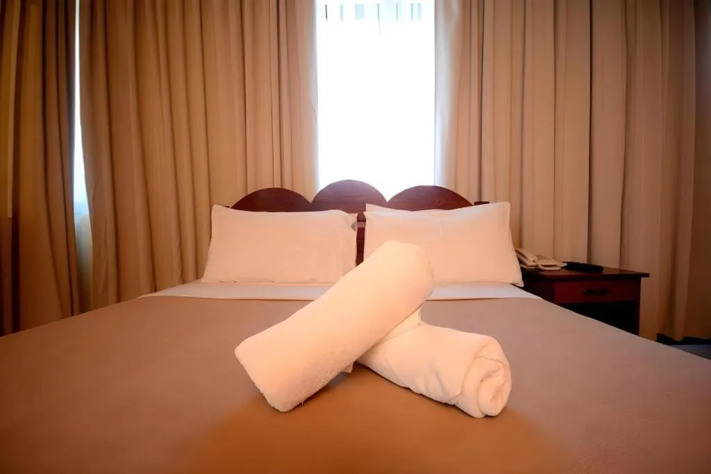 Bed in Ipil Suites El Nido