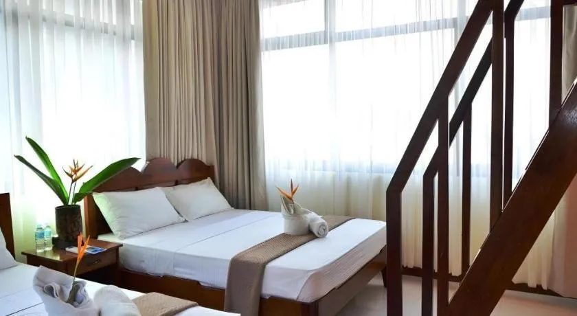 Bed in Ipil Suites El Nido
