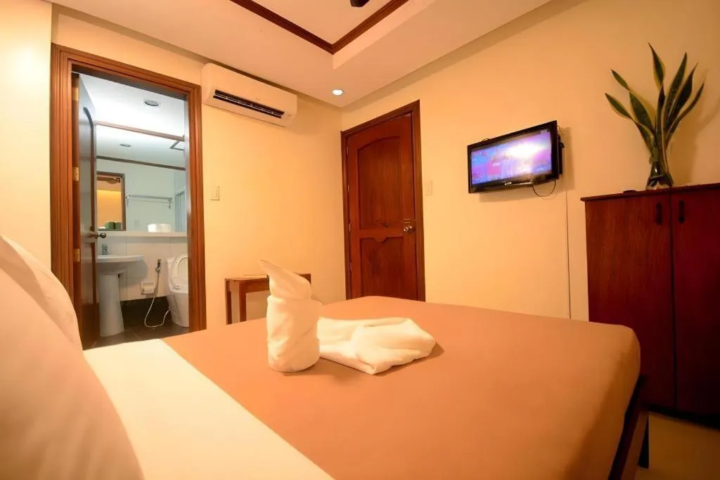 Bed in Ipil Suites El Nido
